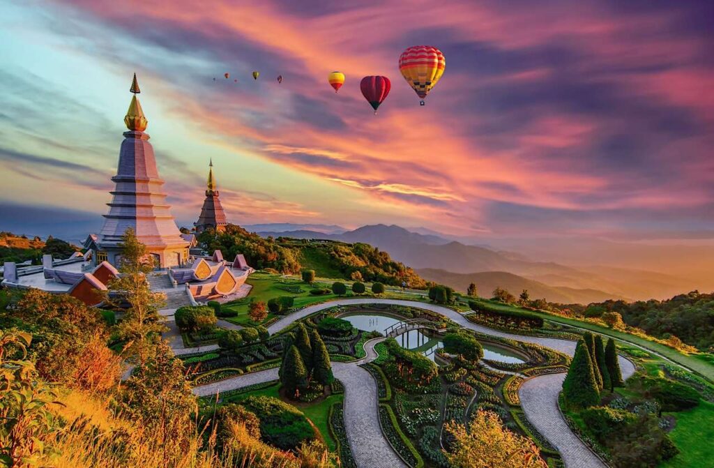 Floating hot air balloons in colorful sky on sunset mountain view, Chiang Mai | Thailand | Swift Travel